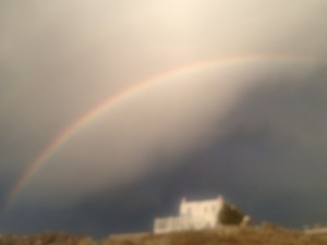 iPhone cameras can't capture double rainbows.  Apparently Steve Jobs was human, after all.